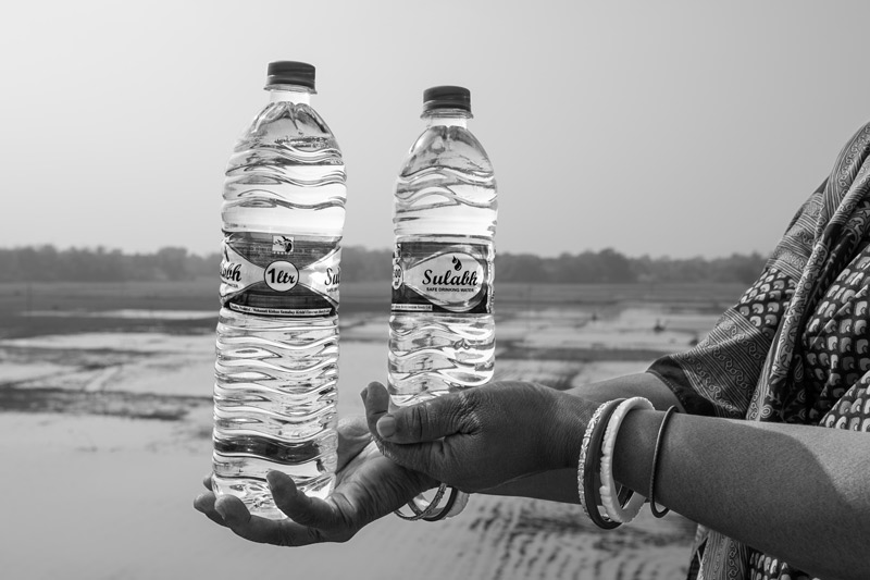 One liter and 500 ml bottles of treated drinking water produced at Sulabh Drinking Water plant in Panchberia village, Paschim Medinipur district, West Bengal